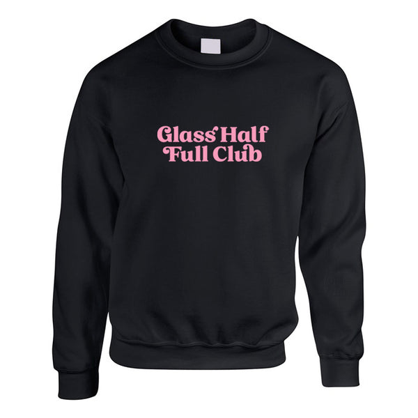 Black Oversized Unisex Sweatshirt with Glass Half Full Club slogan printed in light pink