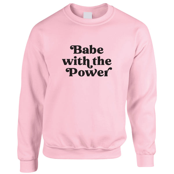David Bowie Goblin King Labyrinth Slogan Sweatshirt. Light pink jumper with a bold 'Babe with the power' design printed in black
