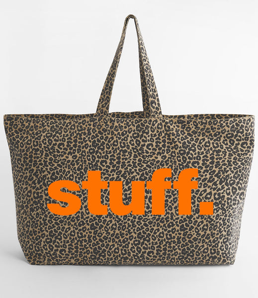Leopard print tote bag with 'stuff.' text in neon orange on a white background