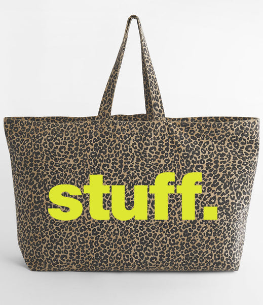 Leopard print tote bag with 'stuff.' text in neon yellow on a white background