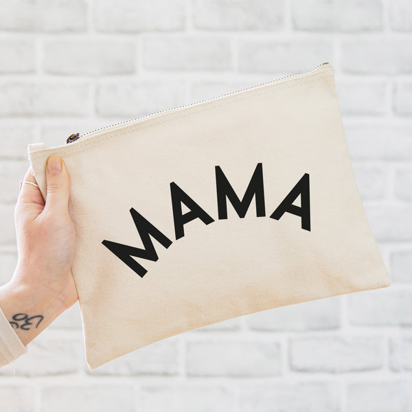 an oversized natural coloured pouch bag printed with the slogan 'mama' in black