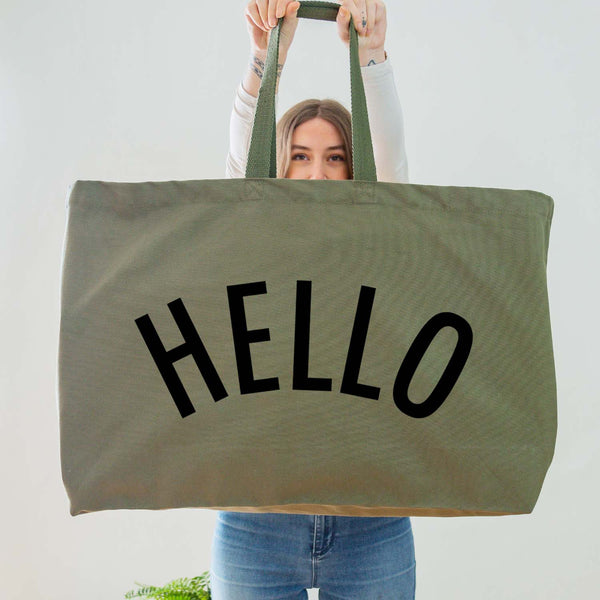 Really Big Oversized Olive Green Tote Bag With the Word 'HELLO' Printed In Big Letters In Black Vinyl