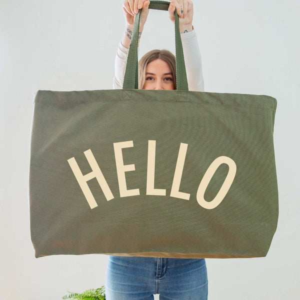 Really Big Oversized Olive Green Tote Bag With the Word 'HELLO' Printed In Big Letters In Cream Vinyl